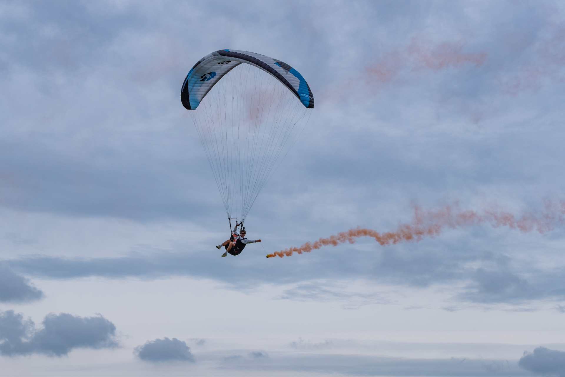 Acro show with smoke bomb